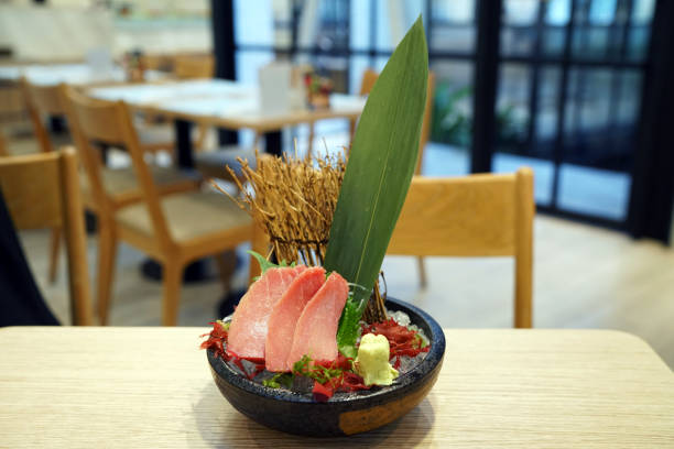 Honmaguro Chutoro Sashimi Set served with wasabi and seaweed on ice, A parts of blue fin tuna, The best traditional food of Japan.