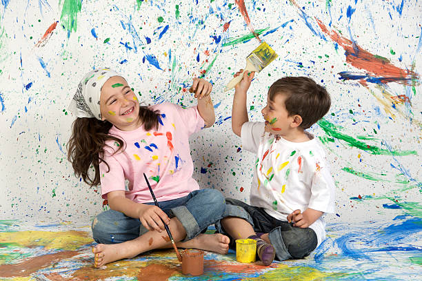istock Children playing with painting 96626775
