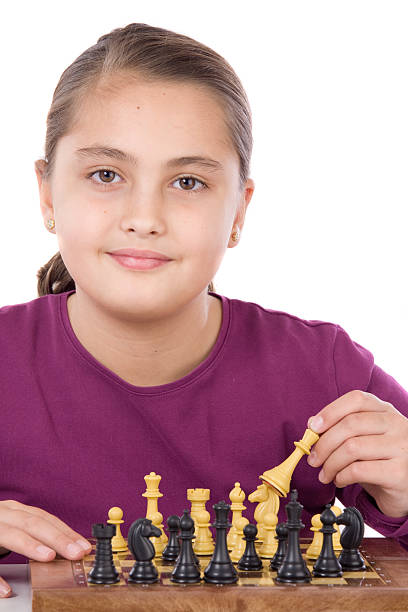 istock Attractive little girl playing chess 96627005