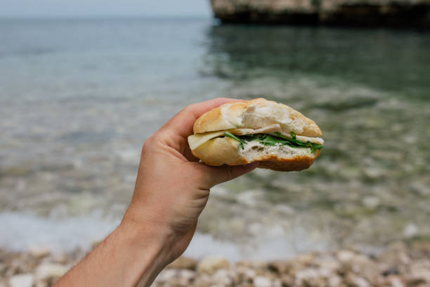 istock Hamburger it the hand in Polignano a Mare apulia Italy 966272470