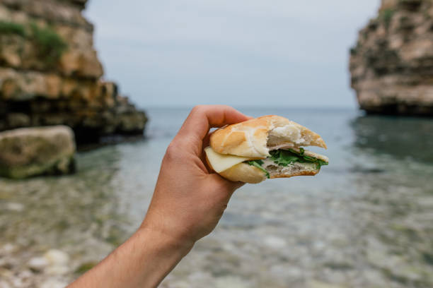 istock Hamburger it the hand in Polignano a Mare apulia Italy 966272582