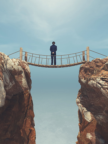 Man rope passing over a bridge suspended between mountains. This is a 3d render illustration.