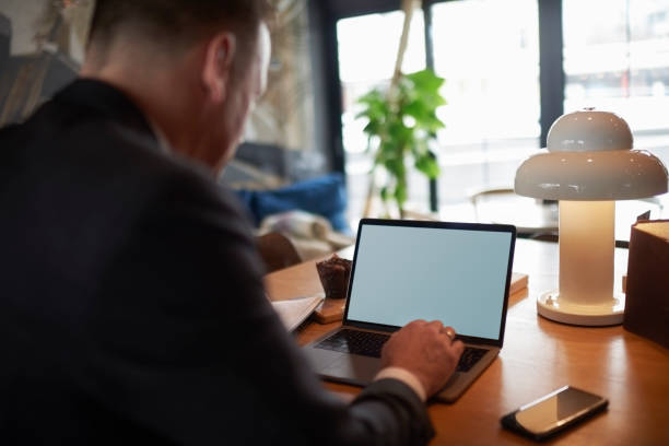 istock Businessman in coffee shop 966288800