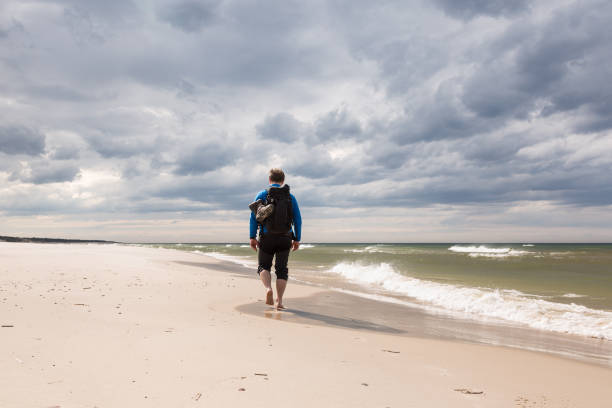 istock Tourist on a sandy beach 966295074