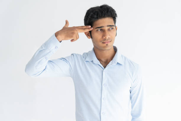 istock Bored Indian guy showing suicide gesture 966302410
