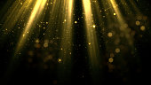 3D rendering of smoothly falling particles and bokeh from the stream of soft top light