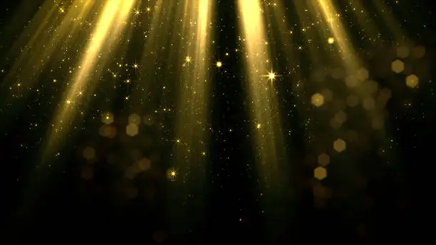 3D rendering of smoothly falling particles and bokeh from the stream of soft magical top light. Bright and shiny particles isolated on a black background