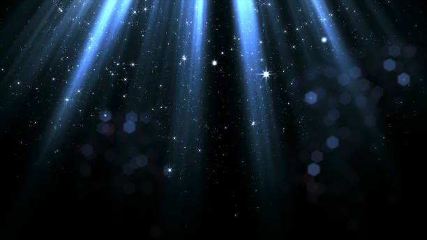 istock 3D rendering of smoothly falling particles and bokeh from the stream of soft top light 966306376
