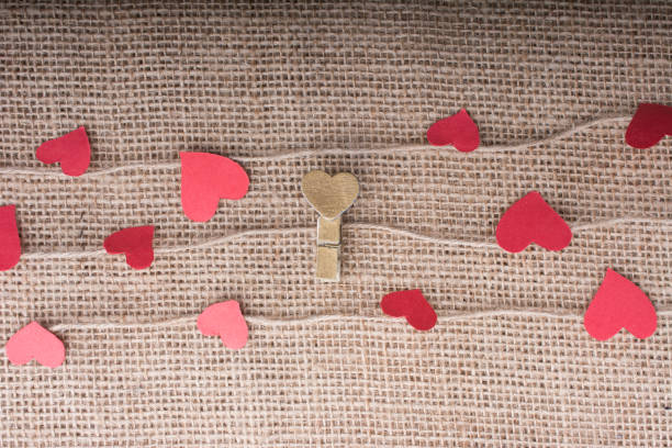 istock Love concept with heart shaped icons on threads 966306748