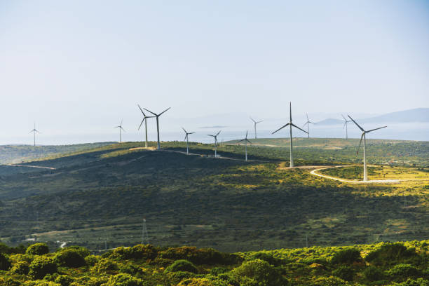 istock Scenic view of windmill farm on sunny spring day 966307728