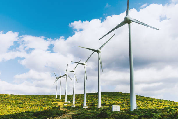 istock Scenic view of windmill farm on sunny spring day 966307772