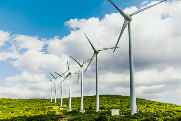 istock Scenic view of windmill farm on sunny spring day 966310518