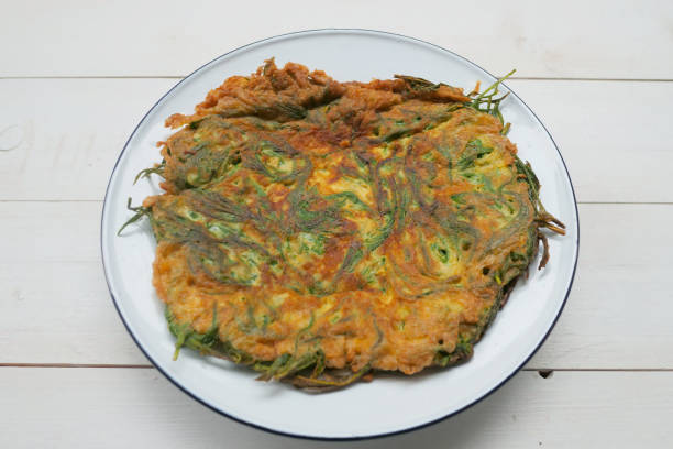 istock Fried egg with climbing wattle  omelette,Thai food 966310614