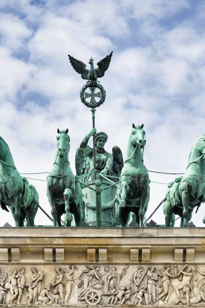 istock Quadriga on Brandenburg Gate, dramatic cloudy sky background, Berlin, Germany 966313822