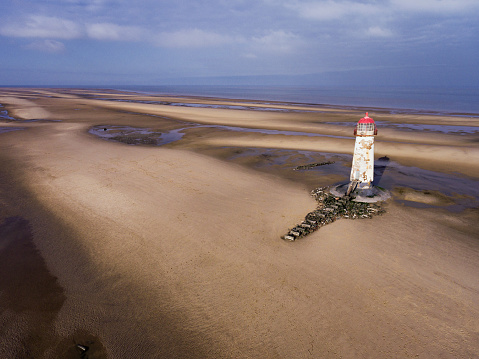Aerial view of the lighthouse on the beach at Talacre in North Wales.