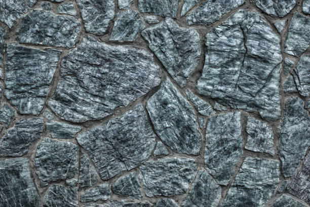 istock Dark abstract background of bluish gray stone wall 966318876