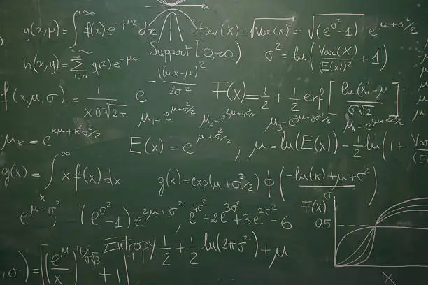 Photo of blackboard full of equations