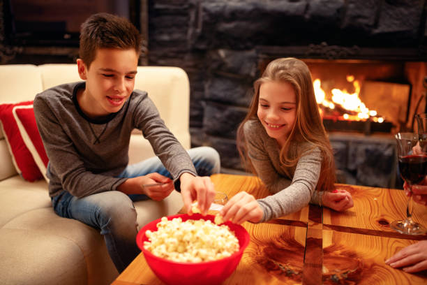 istock Young girl and her brother having fun playing game 966322608
