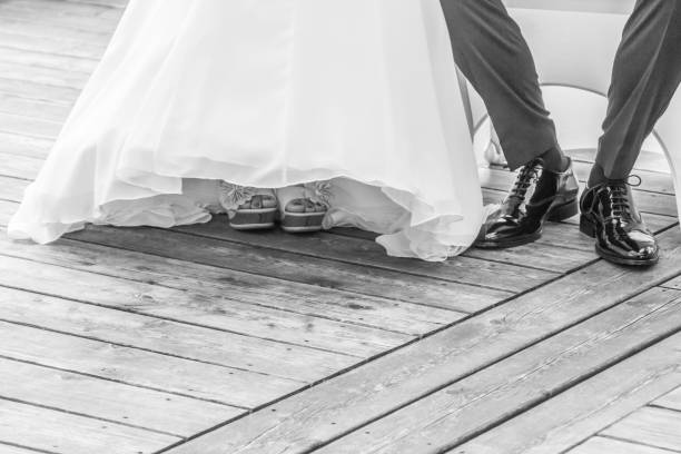 istock Wedding bride and groom sitting next each other at marriage 966323712