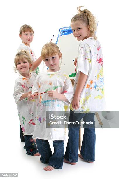 Four Girls Painting At Easel Stock Photo - Download Image Now - Artist, Artist's Canvas, Child