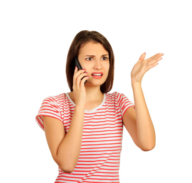 istock Misunderstanding and distant call young woman talking on mobile phone has many questions. emotional girl isolated on white background 966330328
