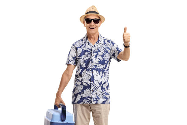 istock Elderly tourist holding a cooling box and making a thumb up gesture 966332126