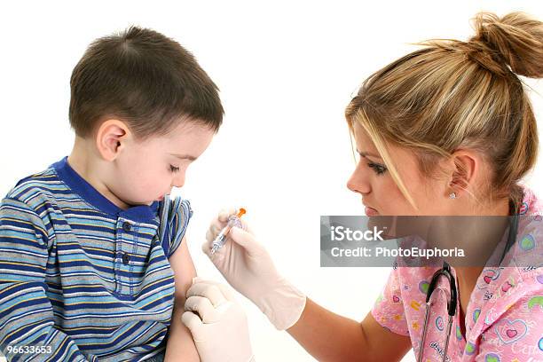 Boy Getting Shot Stock Photo - Download Image Now - Adult, Blond Hair, Boys