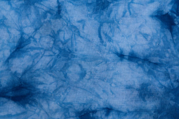 istock Pattern of blue tie batik dye on cotton cloth, Dyed indigo fabric background and textured 966338414