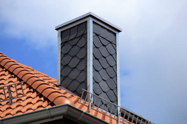 new tiled roof with chimney with slate cladding - chimney imagens e fotografias de stock