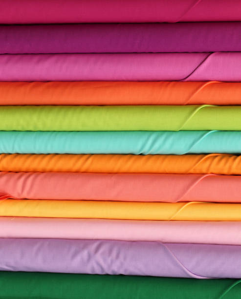 istock rolls of colorful cotton material cloth on store specializing in 966353894