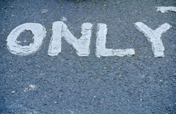 istock road mark painted on asphalt 966354284