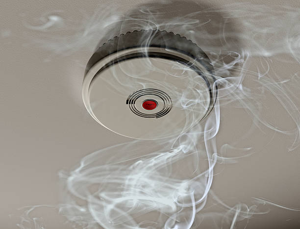 istock Smoke alarm in a smoky room 96635577