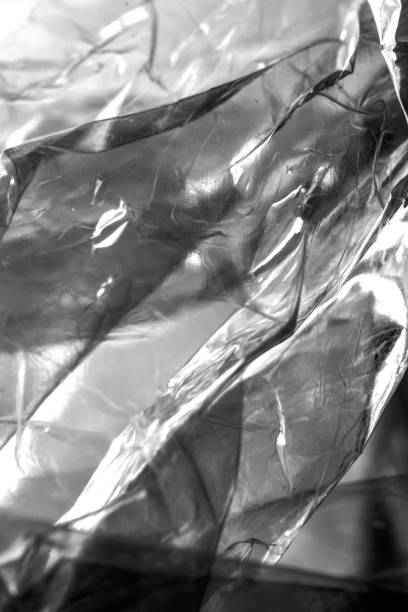 istock Plastic Shiny See Through Abstract Shimmer Creased Background 966358864
