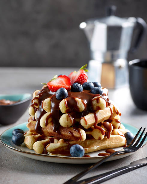 istock Plate of belgian waffles with chocolate sauce 966364434