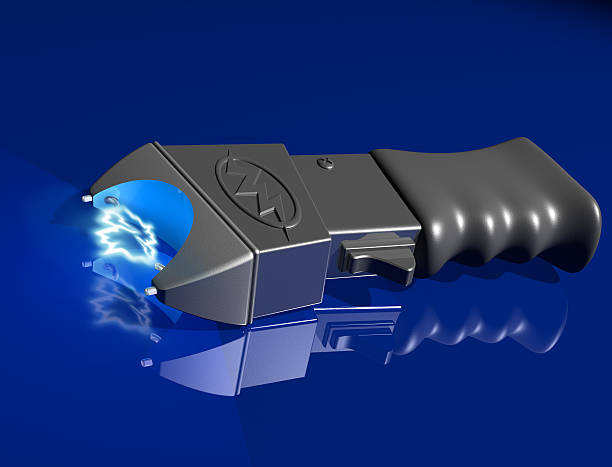 Stun gun on shiny surface stock photo