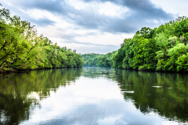 Chattahoochee River Reflections Chattahoochee River in Atlanta on a cloudy day georgia country stock pictures, royalty-free photos & images