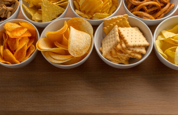 istock Pretzels in bowls on wooden table from above 966365700