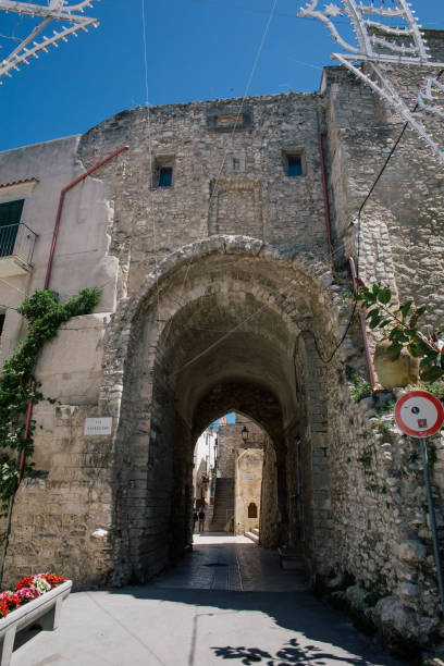 istock Stone arch Trullo trulli old wtite city in Italy 966368736