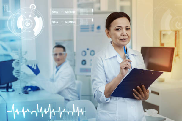 istock Calm woman holding a clipboard and looking thoughtful 966368826