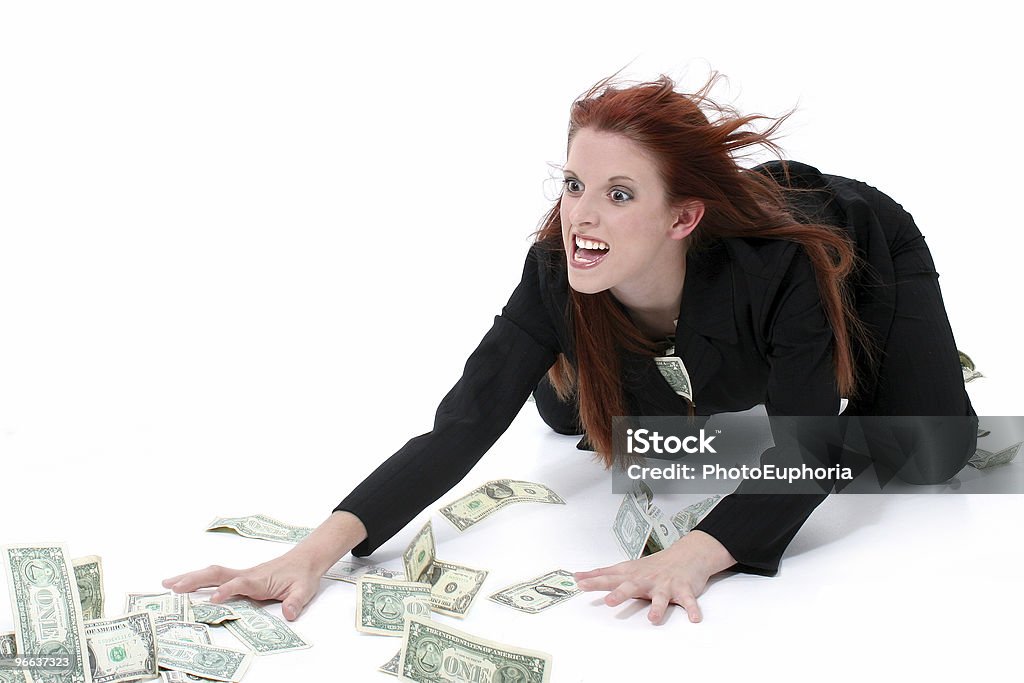Crazed Business Woman Grabbing Money From Floor  Currency Stock Photo