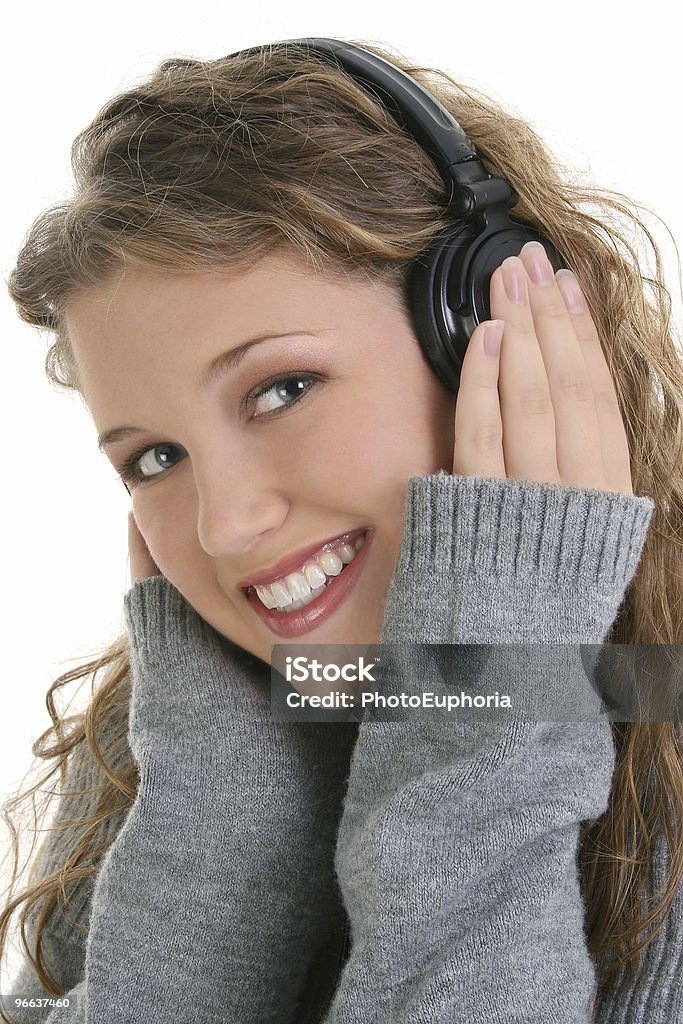 Piękne nastoletnie dziecko dziewczynka noszenie słuchawki - Zbiór zdjęć royalty-free (Bliski)