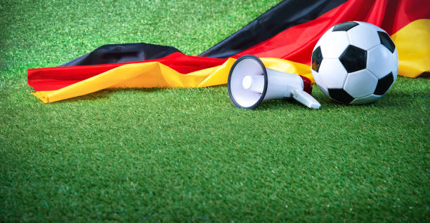 istock Soccer ball with german flag and megaphone 966374942