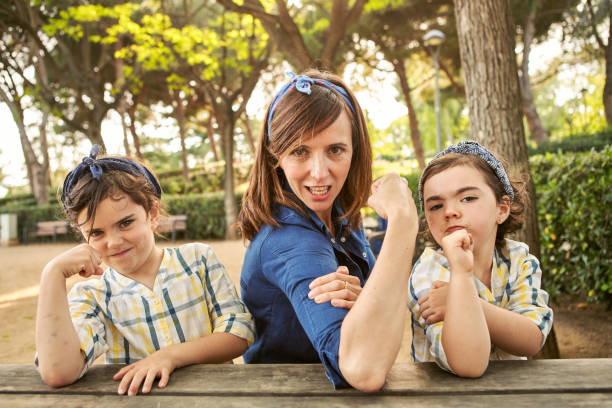 Strong mom flexing her arms - Girl power