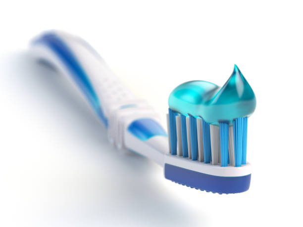spazzolino da denti con pasta isolata su sfondo bianco. - toothpaste glue blue white foto e immagini stock