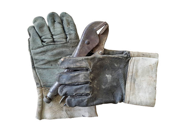 istock old leather gloves are lack with locking pliers on white background 966385666