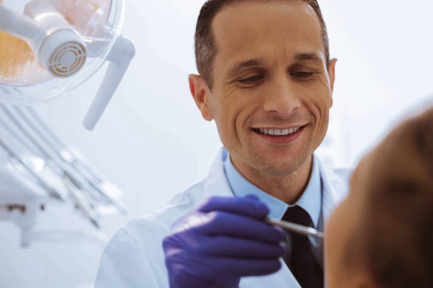 istock Close up of delighted assistant that checking teeth 966389534