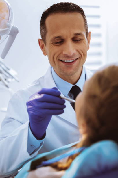 istock Attractive brunette male working in clinic 966389664