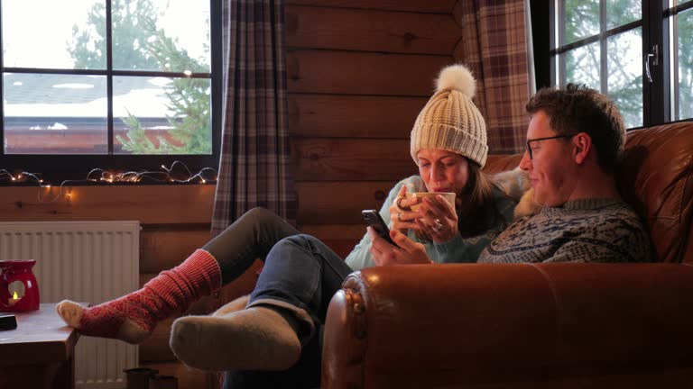 Relaxing on the Sofa with his Wife