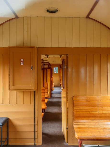 istock Old train carriage with wooden benches 966398776