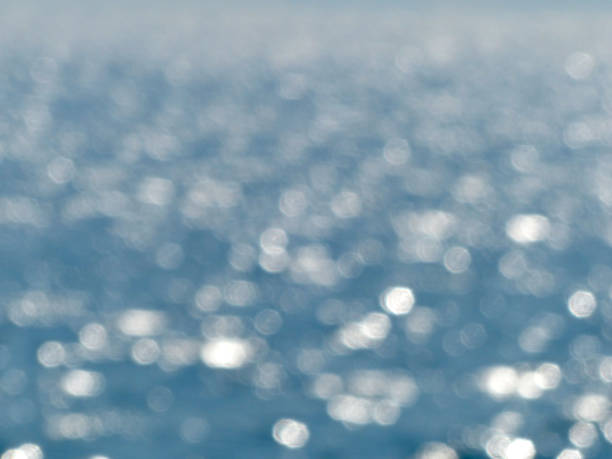 istock blue christmas background with bokeh lights 966399638
